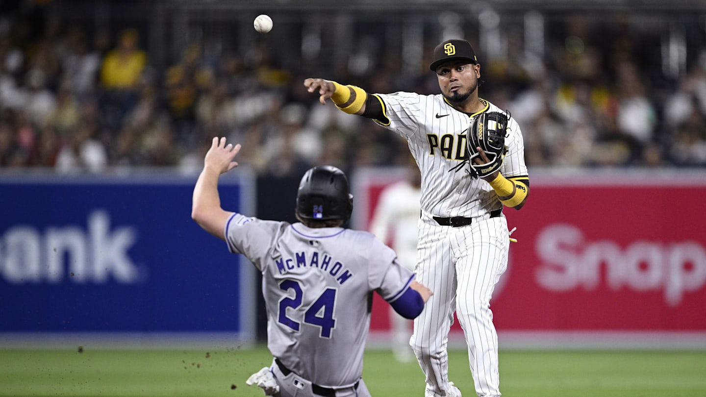 May 13, 2024; San Diego, California, USA; San Diego Padres second baseman Luis Arraez (4) throws to first base after forcing out Colorado Rockies third baseman Ryan McMahon (24) at second base to complete a double play during the sixth inning at Petco Park. Mandatory Credit: Orlando Ramirez-Imagn Images