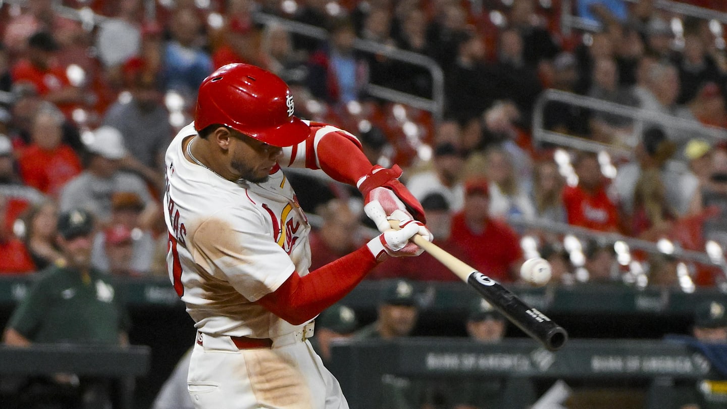 Sep 3, 2025; St. Louis, Missouri, USA;  St. Louis Cardinals first baseman Willson Contreras (40) hits a two run triple against the Athletics during the eighth inning at Busch Stadium. Mandatory Credit: Jeff Curry-Imagn Images
