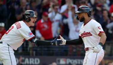 Cleveland Guardians right fielder George Valera (35) celebrates with Kyle Manzardo (9) after scoring during the fourth inning of Game 3 of the American League Wild Card Series at Progressive Field, Oct. 2, 2025, in Cleveland, Ohio.