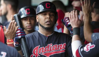 Aug 8, 2018: Cleveland Indians designated hitter Edwin Encarnacion (10) celebrates in the dugout after hitting a sacrifice fly during the first inning against the Minnesota Twins at Progressive Field. Mandatory Credit: Ken Blaze-Imagn Images