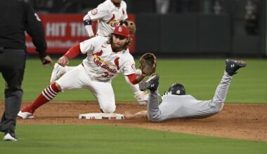 Brendan Donovan fields a ball at second base against the Seattle Mariners.