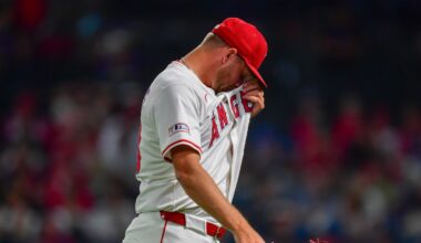 Jul 30, 2025; Anaheim, California, USA; Los Angeles Angels pitcher Reid Detmers (48) walks to the dugout after being relieved against the Texas Rangers during the eighth inning at Angel Stadium. Mandatory Credit: Gary A. Vasquez-Imagn Images