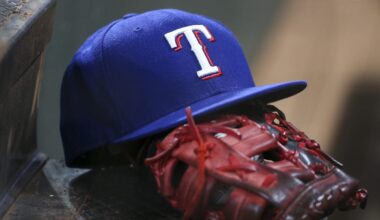 Jul 20, 2019; Houston, TX, USA; A view of the cap and glove of Texas Rangers first baseman Ronald Guzman (11) during the first inning against the Houston Astros at Minute Maid Park. Mandatory Credit: Troy Taormina-Imagn Images