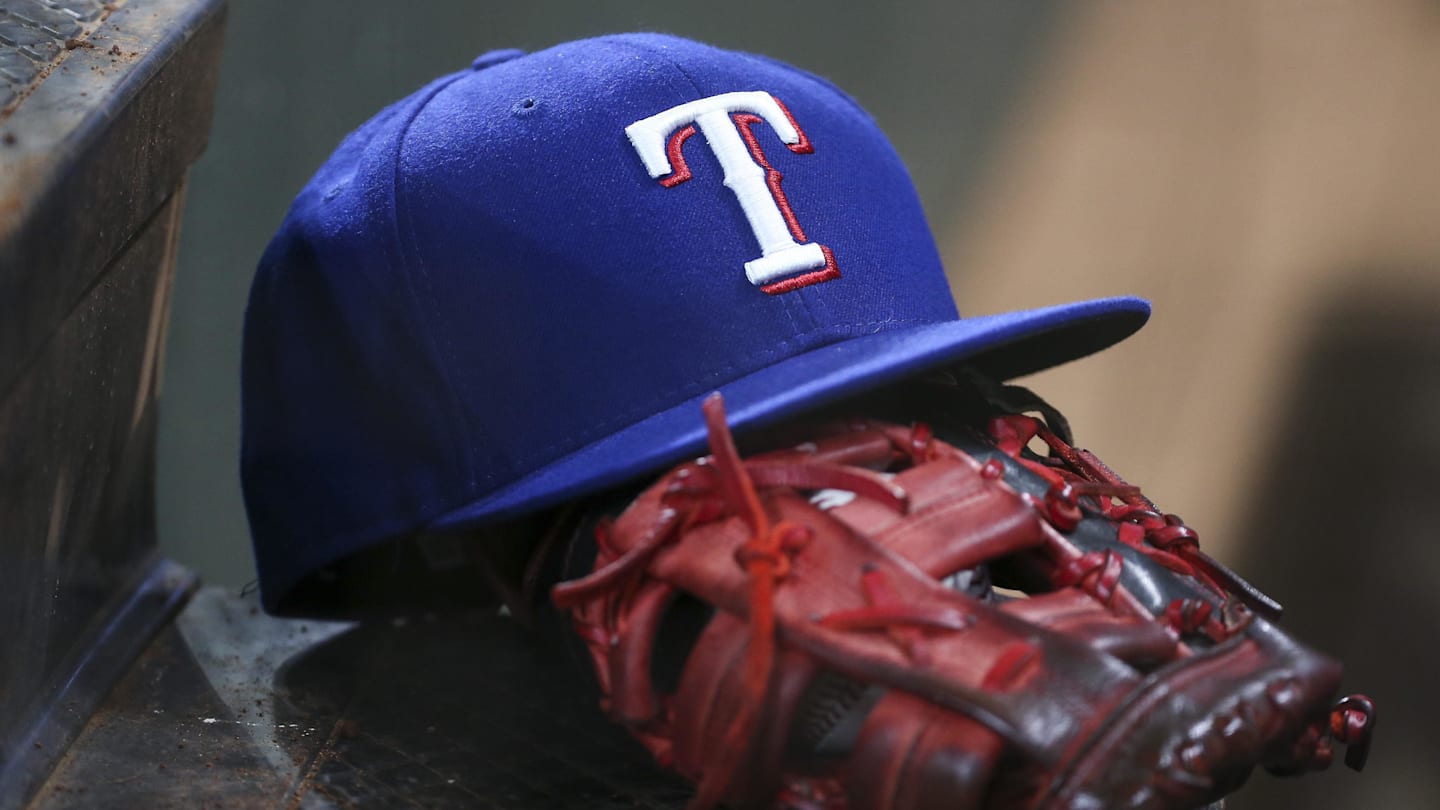 Jul 20, 2019; Houston, TX, USA; A view of the cap and glove of Texas Rangers first baseman Ronald Guzman (11) during the first inning against the Houston Astros at Minute Maid Park. Mandatory Credit: Troy Taormina-Imagn Images