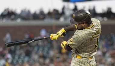 Sep 13, 2024; San Francisco, California, USA;  San Diego Padres first base Luis Arraez (4) hits a single during the first inning against the San Francisco Giants at Oracle Park. Mandatory Credit: Stan Szeto-Imagn Images