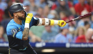 Sep 26, 2025; Philadelphia, Pennsylvania, USA; Philadelphia Phillies second base Edmundo Sosa (33) hits a home run against the Minnesota Twins during the fifth inning at Citizens Bank Park.