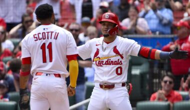 May 7, 2025; St. Louis, Missouri, USA;  St. Louis Cardinals shortstop Masyn Winn (0) reacts after center fielder Victor Scott II (11) scored against the Pittsburgh Pirates during the third inning at Busch Stadium. Mandatory Credit: Jeff Curry-Imagn Images