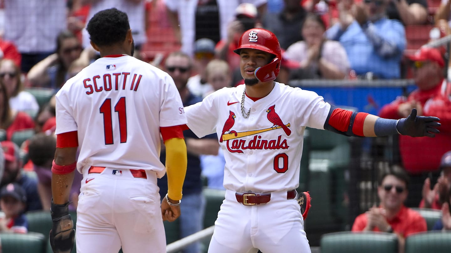May 7, 2025; St. Louis, Missouri, USA;  St. Louis Cardinals shortstop Masyn Winn (0) reacts after center fielder Victor Scott II (11) scored against the Pittsburgh Pirates during the third inning at Busch Stadium. Mandatory Credit: Jeff Curry-Imagn Images