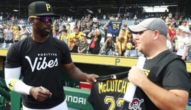 Pittsburgh Pirates designated hitter Andrew McCutchen gives away his game jersey.