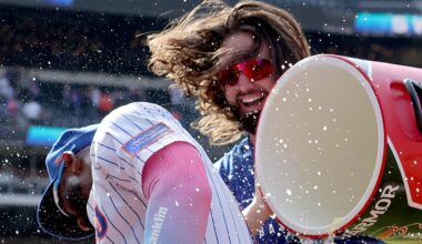 Apr 23, 2025; New York City, New York, USA; New York Mets designated hitter Jesse Winker (3) douses teammate Starling Marte (6) after Marte hit a walkoff single against the Philadelphia Phillies in the tenth inning at Citi Field. Mandatory Credit: Brad Penner-Imagn Images