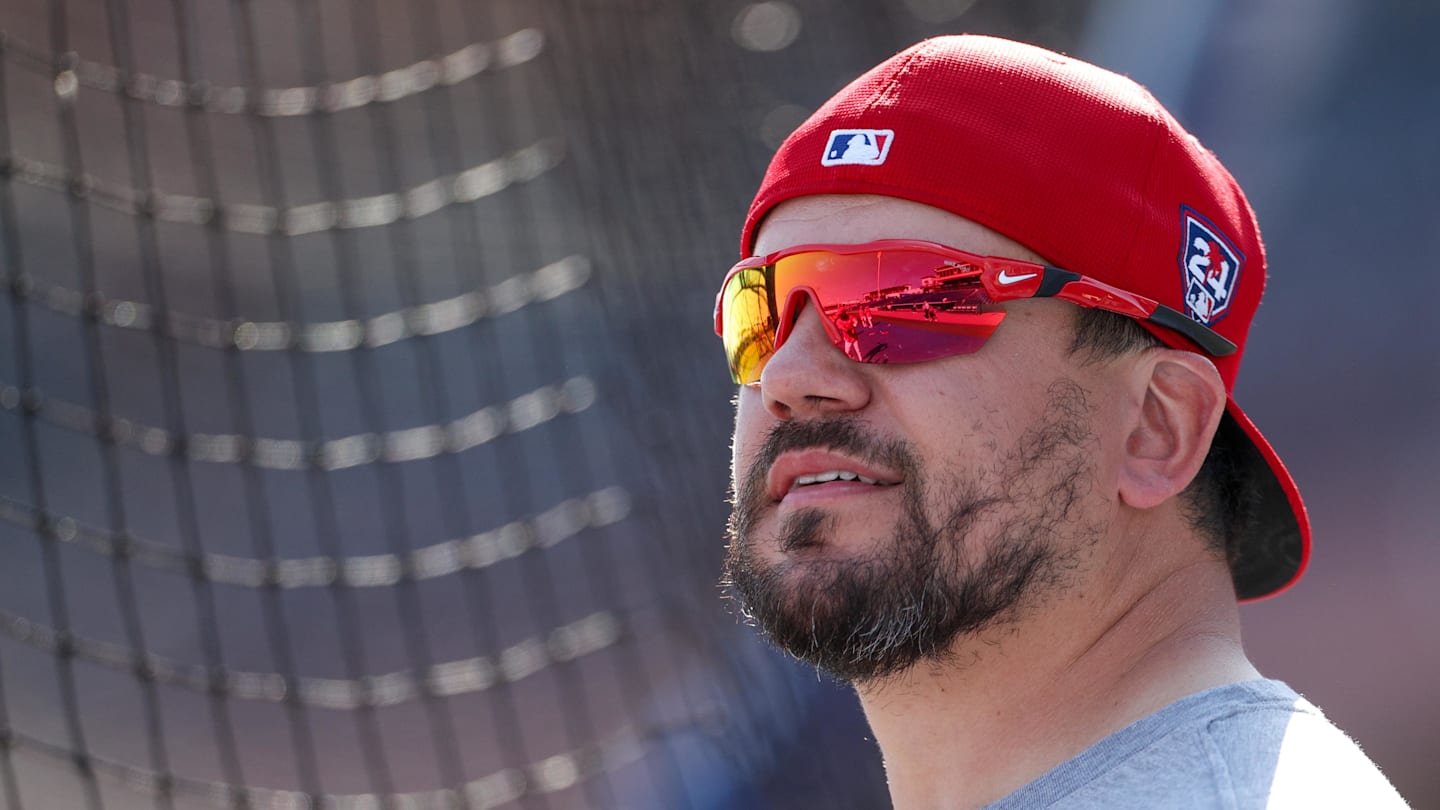 Feb 25, 2024; Clearwater, Florida, USA;  Philadelphia Phillies designated hitter Kyle Schwarber (12) takes batting practice before a game against the New York Yankees at BayCare Ballpark.