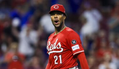 Cincinnati Reds starting pitcher Hunter Greene (21) reacts