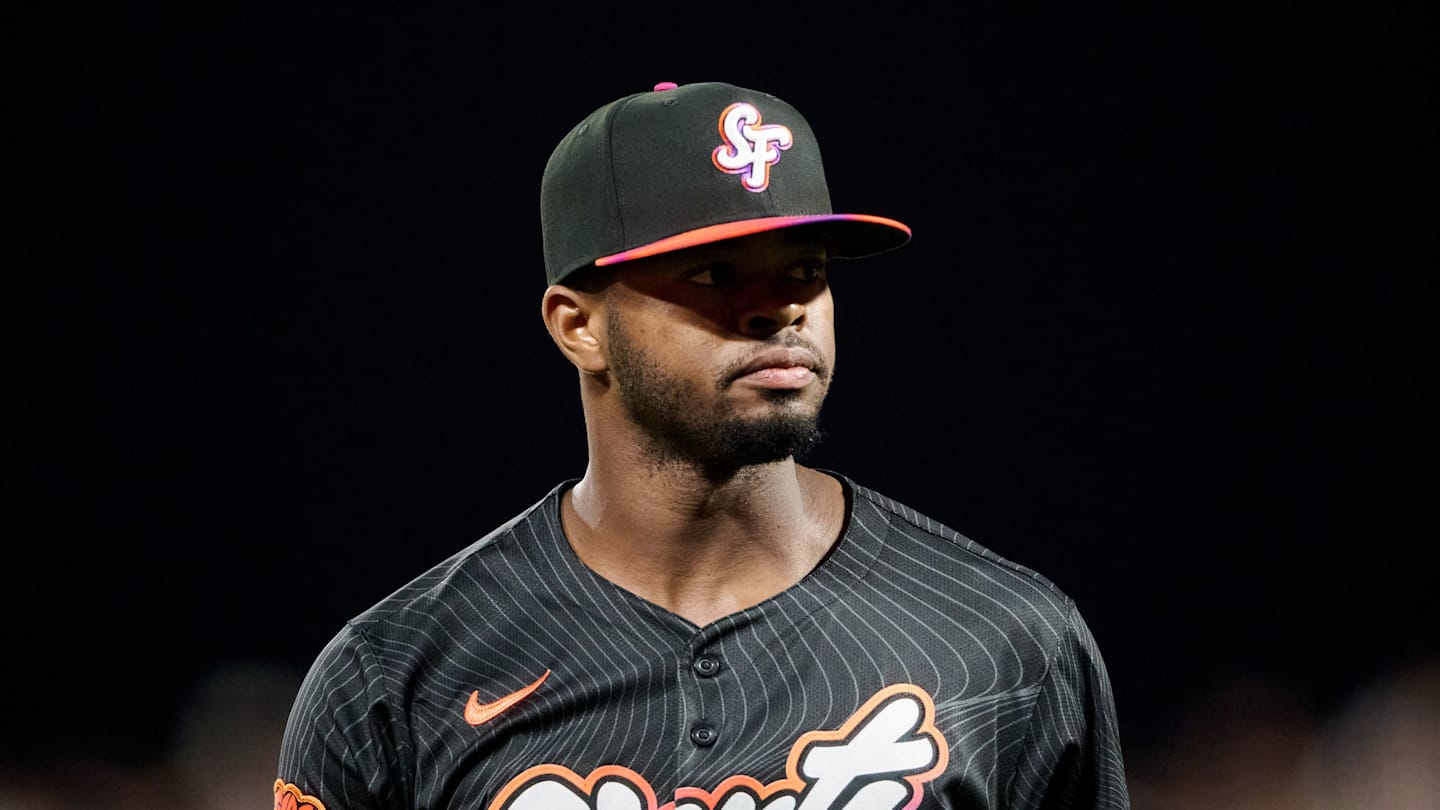 Sep 9, 2025; San Francisco, California, USA; San Francisco Giants pitcher Joel Peguero (63) walks to the dugout against the Arizona Diamondbacks after the last out of the sixth inning at Oracle Park. Mandatory Credit: Robert Edwards-Imagn Images