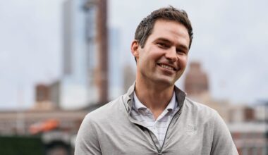 Detroit Tigers president of baseball operations Scott Harris talks to a TV reporter before a game against Chicago White Sox at Comerica Park in Detroit on Friday, Sept. 27, 2024.