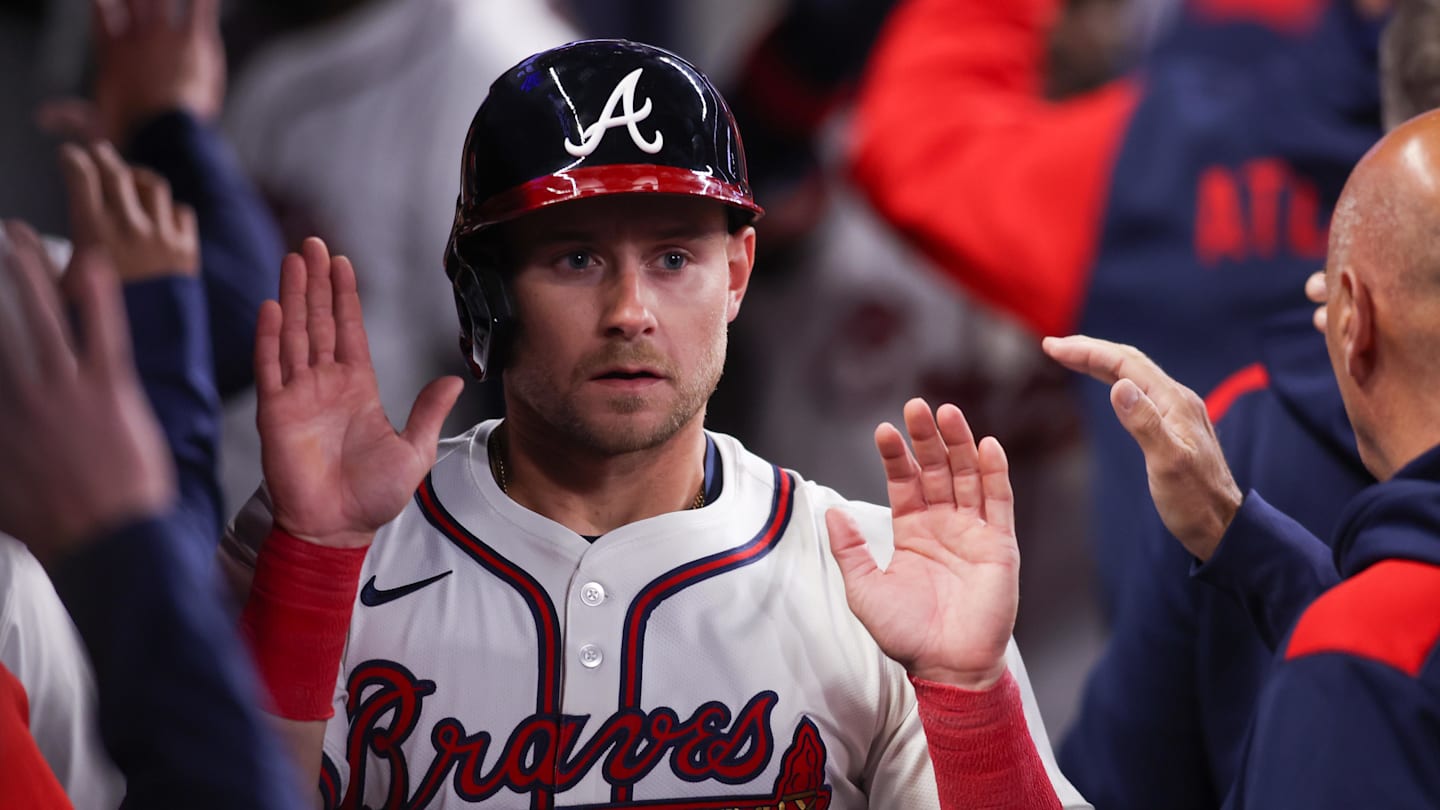 Apr 8, 2025; Atlanta, Georgia, USA; Atlanta Braves left fielder Jarred Kelenic (24) celebrates with teammates after scoring a run against the Philadelphia Phillies in the sixth inning at Truist Park. Mandatory Credit: Brett Davis-Imagn Images