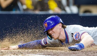 Jul 29, 2025; San Diego, California, USA; New York Mets second baseman Brett Baty (7) scores a run during the fifth inning against the San Diego Padres at Petco Park. Mandatory Credit: David Frerker-Imagn Images