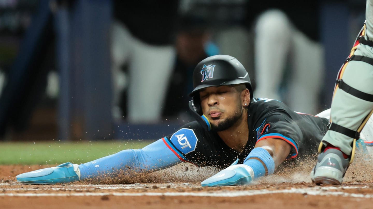 Sep 5, 2025; Miami, Florida, USA; Miami Marlins center fielder Victor Mesa Jr. (10) scores against the Philadelphia Phillies during the third inning at loanDepot Park. Mandatory Credit: Sam Navarro-Imagn Images