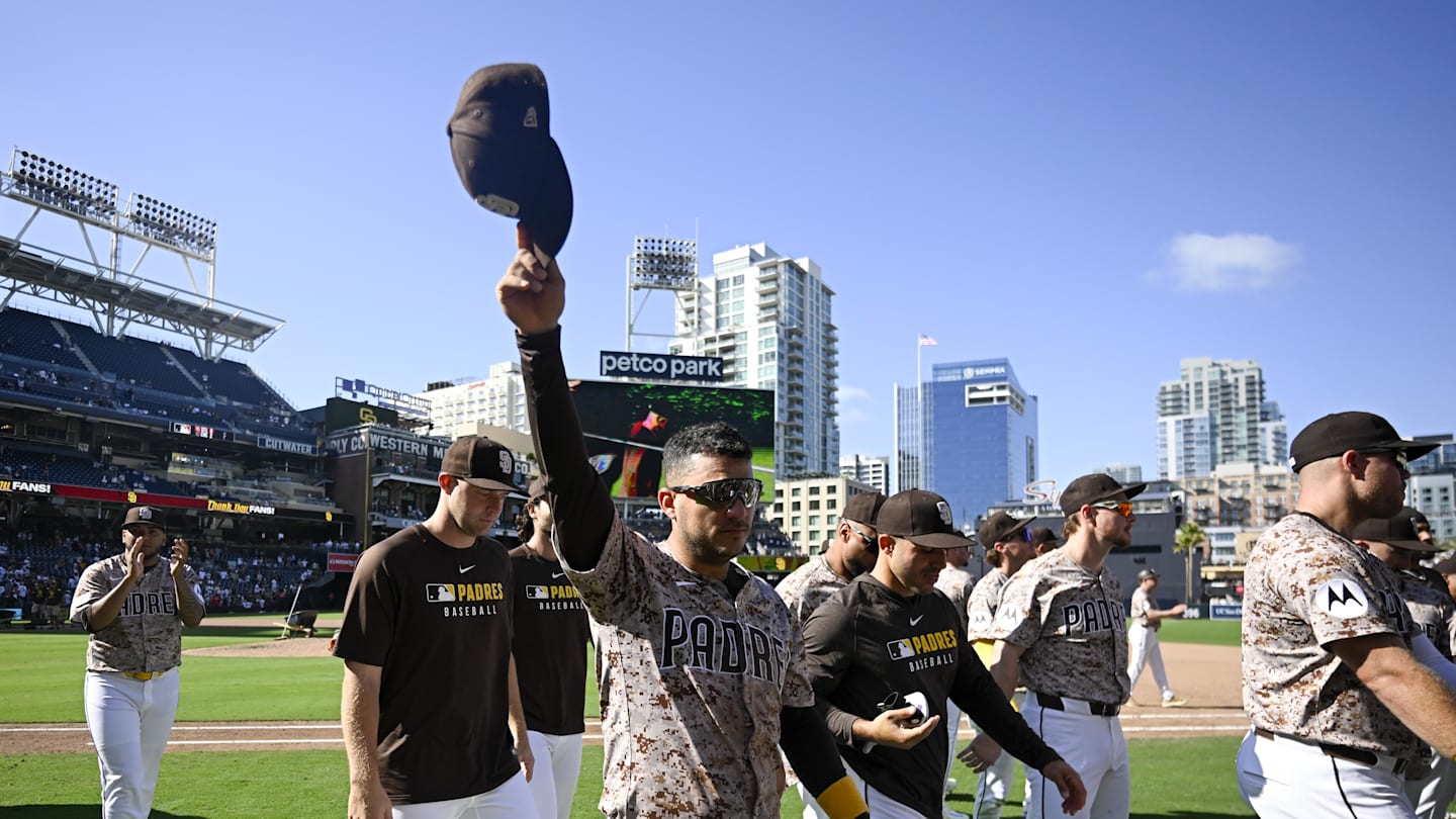 Sep 28, 2025; San Diego, California, USA; San Diego Padres second baseman Jose Iglesias (7) tips his cap to the fans after the Padres beat the Arizona Diamondbacks at Petco Park. Mandatory Credit: Denis Poroy-Imagn Images