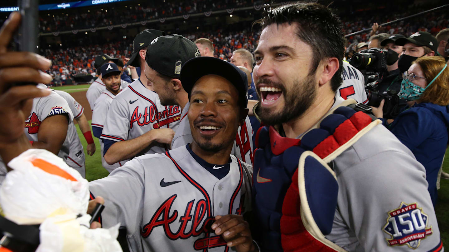 Nov 2, 2021; Houston, TX, USA; Atlanta Braves catcher Travis d'Arnaud (right) takes a selfie photo with a teammate after defeating the Houston Astros in game six of the 2021 World Series at Minute Maid Park. Mandatory Credit: Troy Taormina-Imagn Images