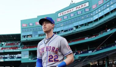 Jul 23, 2023; Boston, Massachusetts, USA; New York Mets third baseman Brett Baty (22) walks onto the field before the start of the game against the Boston Red Sox at Fenway Park. Mandatory Credit: David Butler II-Imagn Images