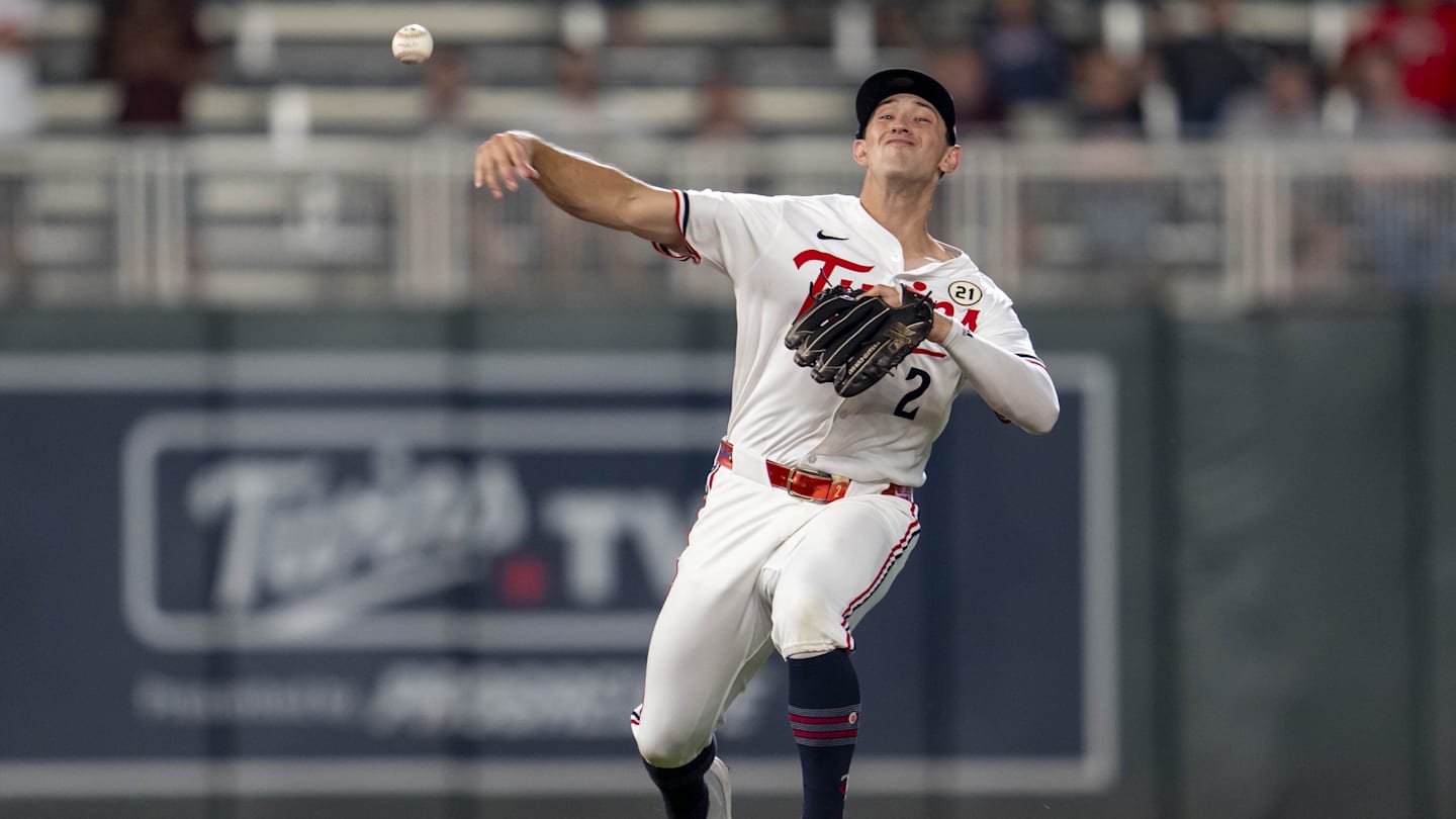 Sep 15, 2025; Minneapolis, Minnesota, USA; Minnesota Twins shortstop Brooks Lee (2) throws the ball to first base against the New York Yankees in the ninth inning at Target Field. Mandatory Credit: Jesse Johnson-Imagn Images