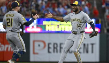Sep 20, 2025: Milwaukee Brewers first baseman Andruw Monasterio (14) celebrates with third baseman Caleb Durbin (21) after the Brewers defeated the St. Louis Cardinals at Busch Stadium.