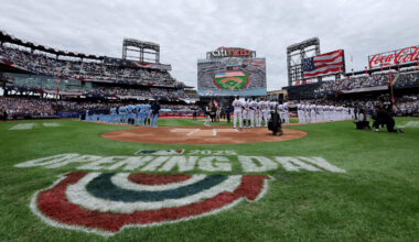 Apr 4, 2025; New York City, New York, USA; New York Mets and Toronto Blue Jays players stand on the baselines for the national anthem before the Mets home opener at Citi Field. Mandatory Credit: Brad Penner-Imagn Images