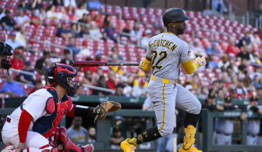 Aug 26, 2025; St. Louis, Missouri, USA;  Pittsburgh Pirates designated hitter Andrew McCutchen (22) hits a two run single against the St. Louis Cardinals during the first inning at Busch Stadium. Mandatory Credit: Jeff Curry-Imagn Images