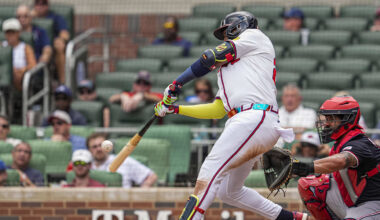 Sep 24, 2025; Cumberland, Georgia, USA; Atlanta Braves designated hitter Marcell Ozuna (20) hits a home run against the Washington Nationals during the eighth inning at Truist Park. Mandatory Credit: Dale Zanine-Imagn Images