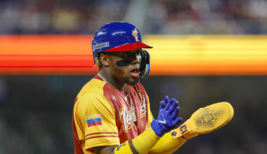 Mar 12, 2023; Miami, Florida, USA; Venezuela center fielder Ronald Acuna Jr. (42) reacts from third base during the first inning against Puerto Rico at LoanDepot Park. Mandatory Credit: Sam Navarro-Imagn Images
