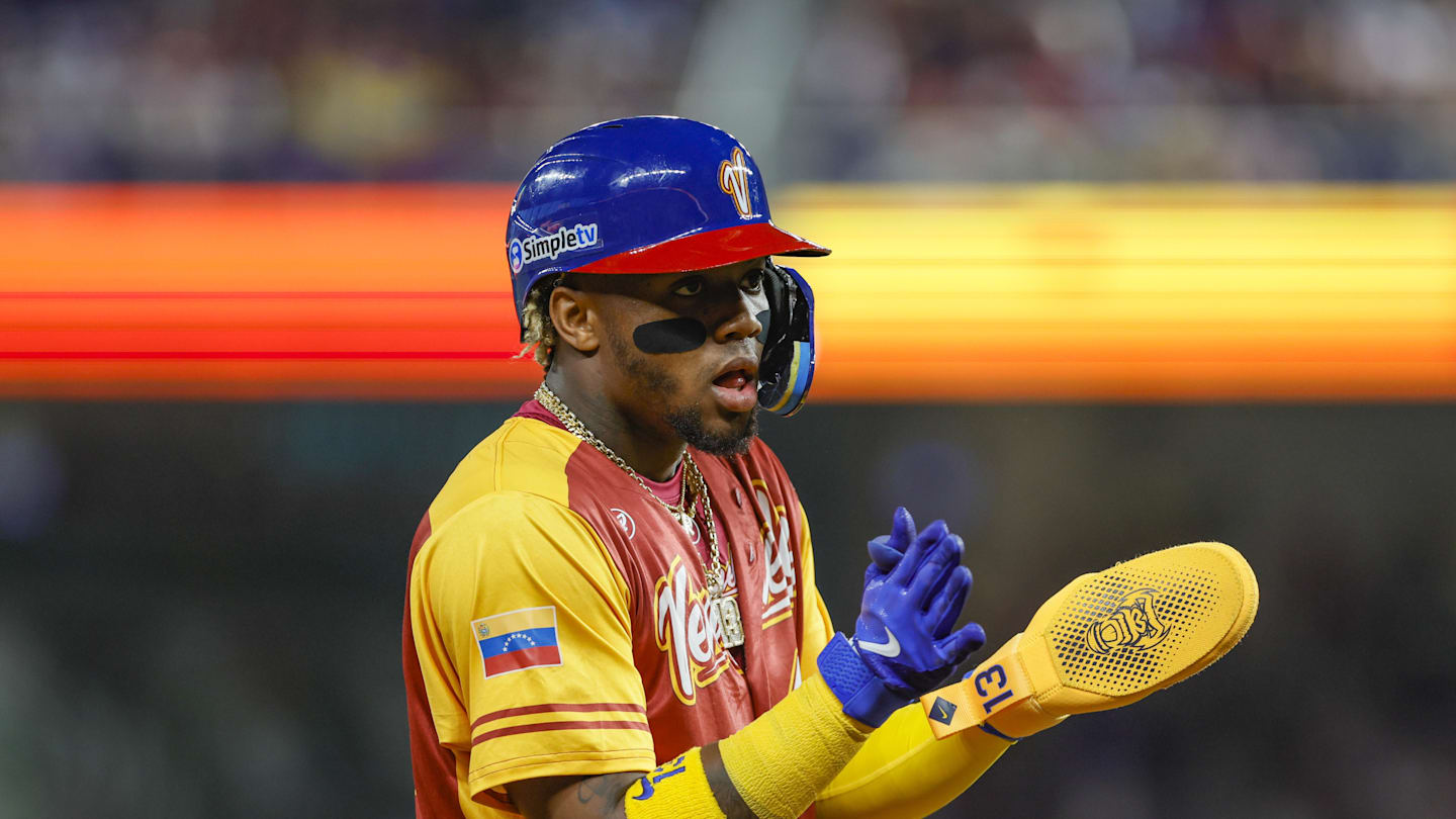 Mar 12, 2023; Miami, Florida, USA; Venezuela center fielder Ronald Acuna Jr. (42) reacts from third base during the first inning against Puerto Rico at LoanDepot Park. Mandatory Credit: Sam Navarro-Imagn Images