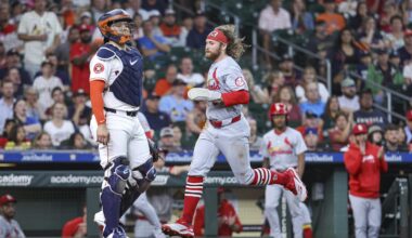 Jun 5, 2024; Houston, Texas, USA; St. Louis Cardinals left fielder Brendan Donovan (33) scores a run past Houston Astros designated hitter Yainer Diaz (21) during the fifth inning at Minute Maid Park. Mandatory Credit: Troy Taormina-Imagn Images