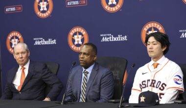 Jan 5, 2026; Houston, TX, USA; Houston Astros general manager Dana Brown (middle) talks and owner Jim Crane (left) looks on during a press conference to introduce Japanese pitcher Tatsuya Imai at Daikin Park. Mandatory Credit: Troy Taormina-Imagn Images