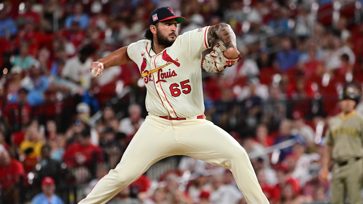 Jul 26, 2025; St. Louis, Missouri, USA;  St. Louis Cardinals pitcher Andre Granillo (65) pitches in relief against the San Diego Padres in the ninth inning at Busch Stadium. Mandatory Credit: Tim Vizer-Imagn Images