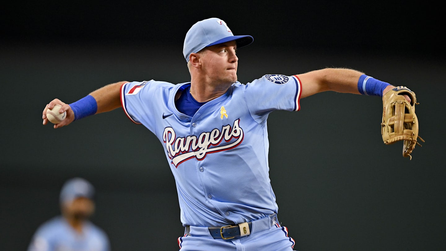 Sep 7, 2025; Arlington, Texas, USA; Texas Rangers third baseman Josh Jung (6) throws out Houston Astros catcher Yainer Diaz (not pictured) during the second inning at Globe Life Field. Mandatory Credit: Jerome Miron-Imagn Images