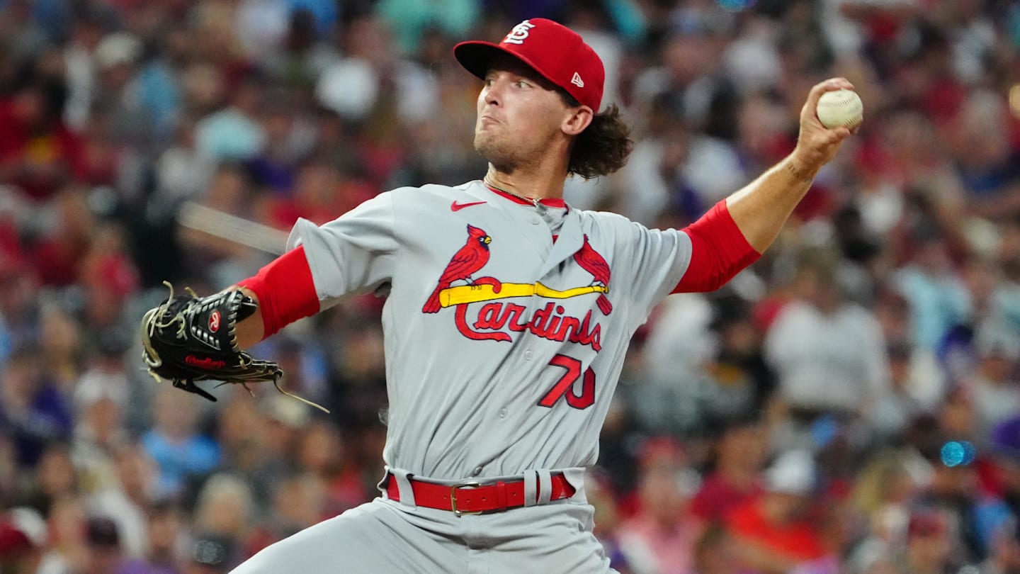 Aug 9, 2022; Denver, Colorado, USA; St. Louis Cardinals relief pitcher Packy Naughton (70) delivers a pitch in the fourth inning against the Colorado Rockies at Coors Field. Mandatory Credit: Ron Chenoy-Imagn Images