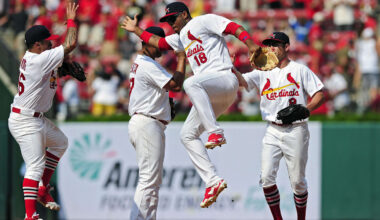 Aug 3, 2014; St. Louis, MO, USA; St. Louis Cardinals right fielder Oscar Taveras (18) celebrates with second baseman Kolten Wong (16) after defeating the Milwaukee Brewers at Busch Stadium. The Cardinals defeated the Brewers 3-2. Mandatory Credit: Jeff Curry-Imagn Images