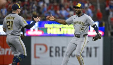 Sep 20, 2025; St. Louis, Missouri, USA; Milwaukee Brewers first baseman Andruw Monasterio (14) celebrates with third baseman Caleb Durbin (21) after the Brewers defeated the St. Louis Cardinals at Busch Stadium. Mandatory Credit: Jeff Curry-Imagn Images