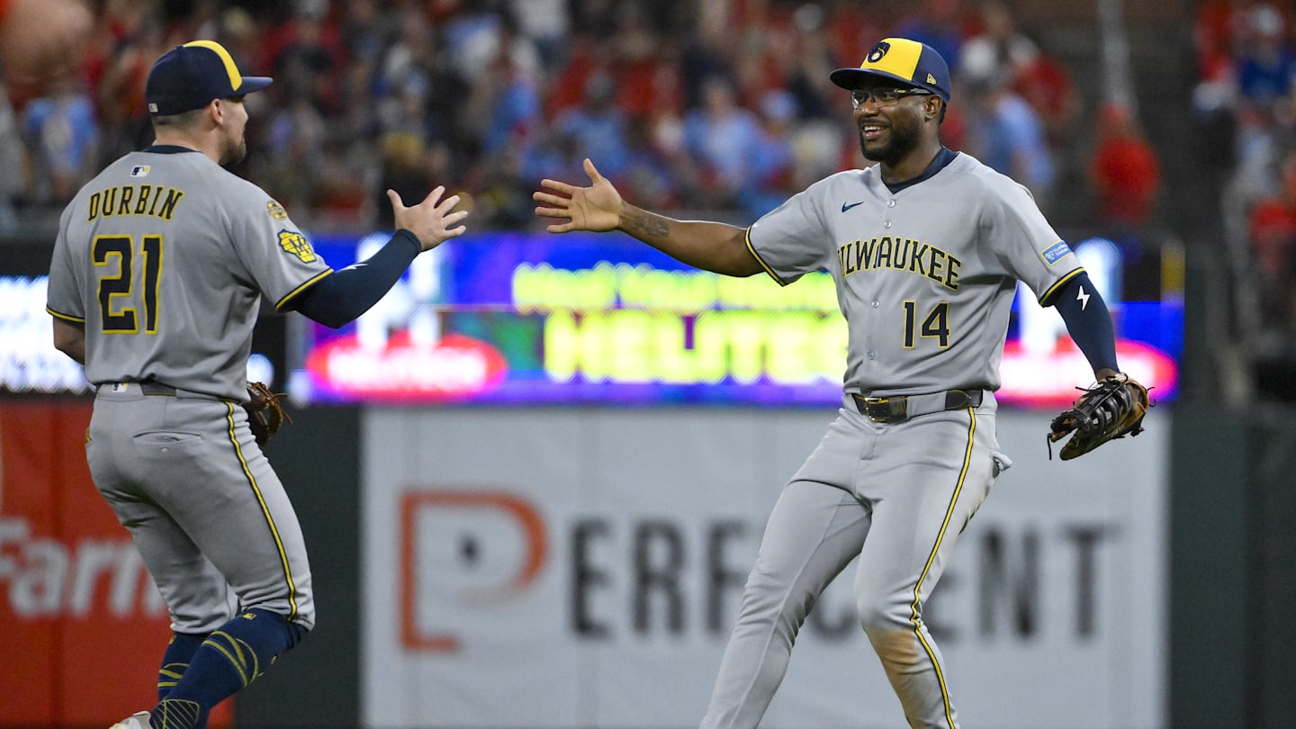 Sep 20, 2025; St. Louis, Missouri, USA; Milwaukee Brewers first baseman Andruw Monasterio (14) celebrates with third baseman Caleb Durbin (21) after the Brewers defeated the St. Louis Cardinals at Busch Stadium. Mandatory Credit: Jeff Curry-Imagn Images
