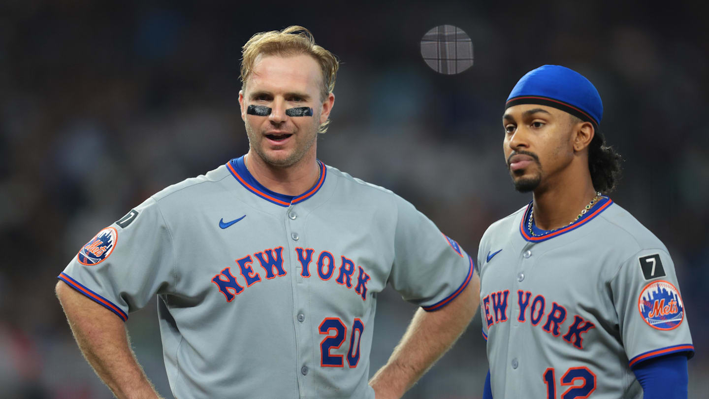 Sep 28, 2025; Miami, Florida, USA; New York Mets first baseman Pete Alonso (20) reacts while standing next to shortstop Francisco Lindor (12) after his at bat against the Miami Marlins during the fifth inning at loanDepot Park. Mandatory Credit: Sam Navarro-Imagn Images