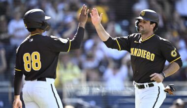 Mar 26, 2024; San Diego, California, USA; San Diego Padres catcher Ethan Salas (88) celebrates with third baseman Graham Pauley (right) after scoring runs against the Seattle Mariners during the seventh inning at Petco Park. Mandatory Credit: Orlando Ramirez-Imagn Images