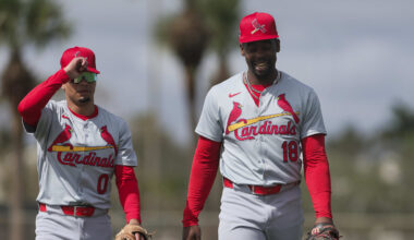 Feb 19, 2024; Jupiter, FL, USA; St. Louis Cardinals right fielder Jordan Walker (18) and shortstop Masyn Winn (0) react during a workout at spring training. Mandatory Credit: Sam Navarro-Imagn Images