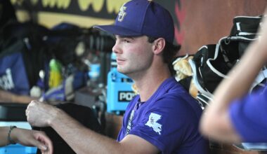 Jun 21, 2025; Omaha, Neb, USA;  LSU Tigers starting pitcher Kade Anderson (32) sits in the dugout between the eighth and ninth innings against the Coastal Carolina Chanticleers at Charles Schwab Field. Mandatory Credit: Steven Branscombe-Imagn Images