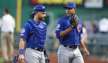 Chicago Cubs catcher Jonathan Lucroy (25) and starting pitcher Jose Quintana.