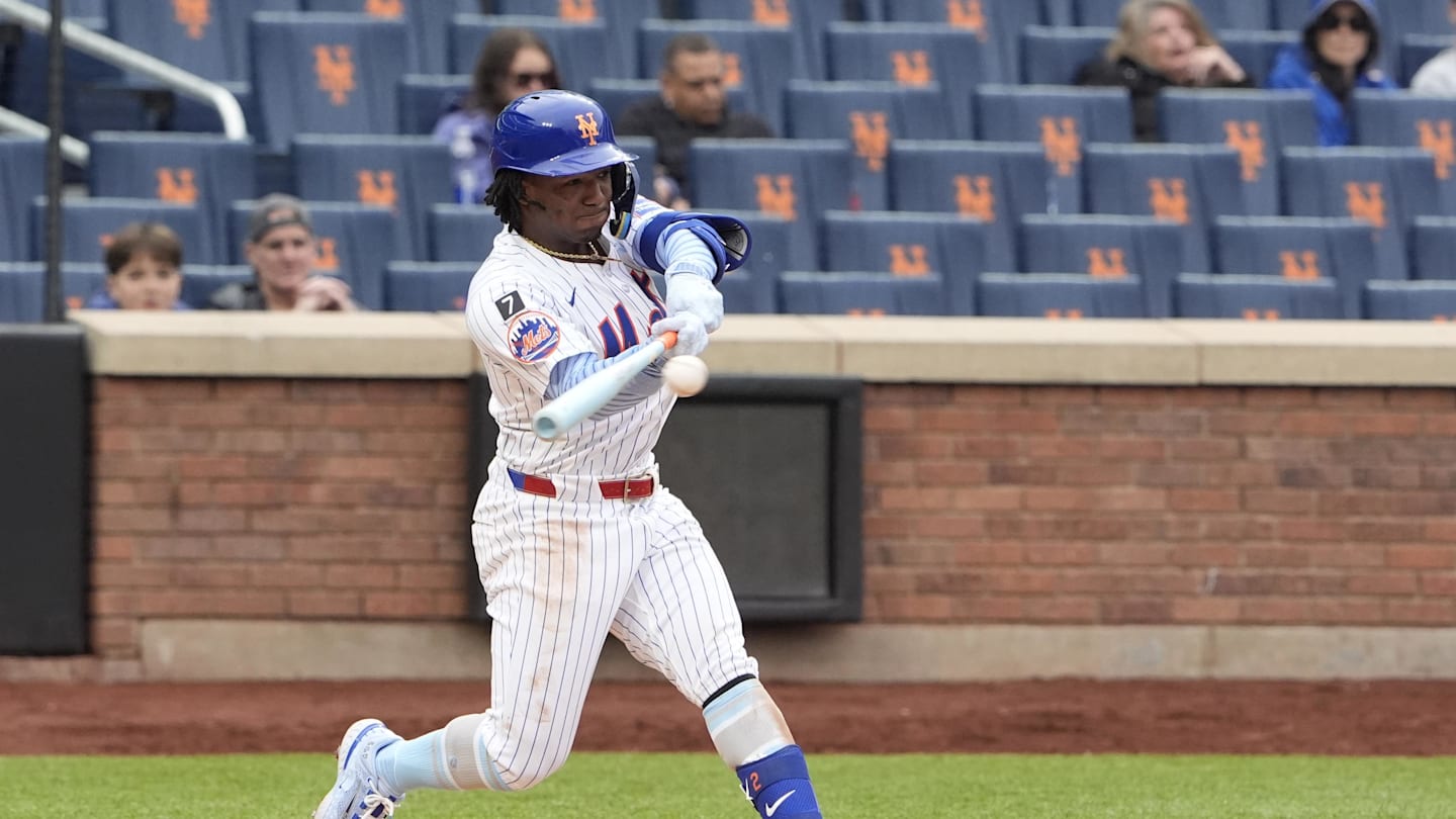 Jun 15, 2025; New York City, New York, USA;  New York Mets shortstop Luisangel Acuna (2) hits a single against the Tampa Bay Rays during the ninth inning at Citi Field. Mandatory Credit: Gregory Fisher-Imagn Images