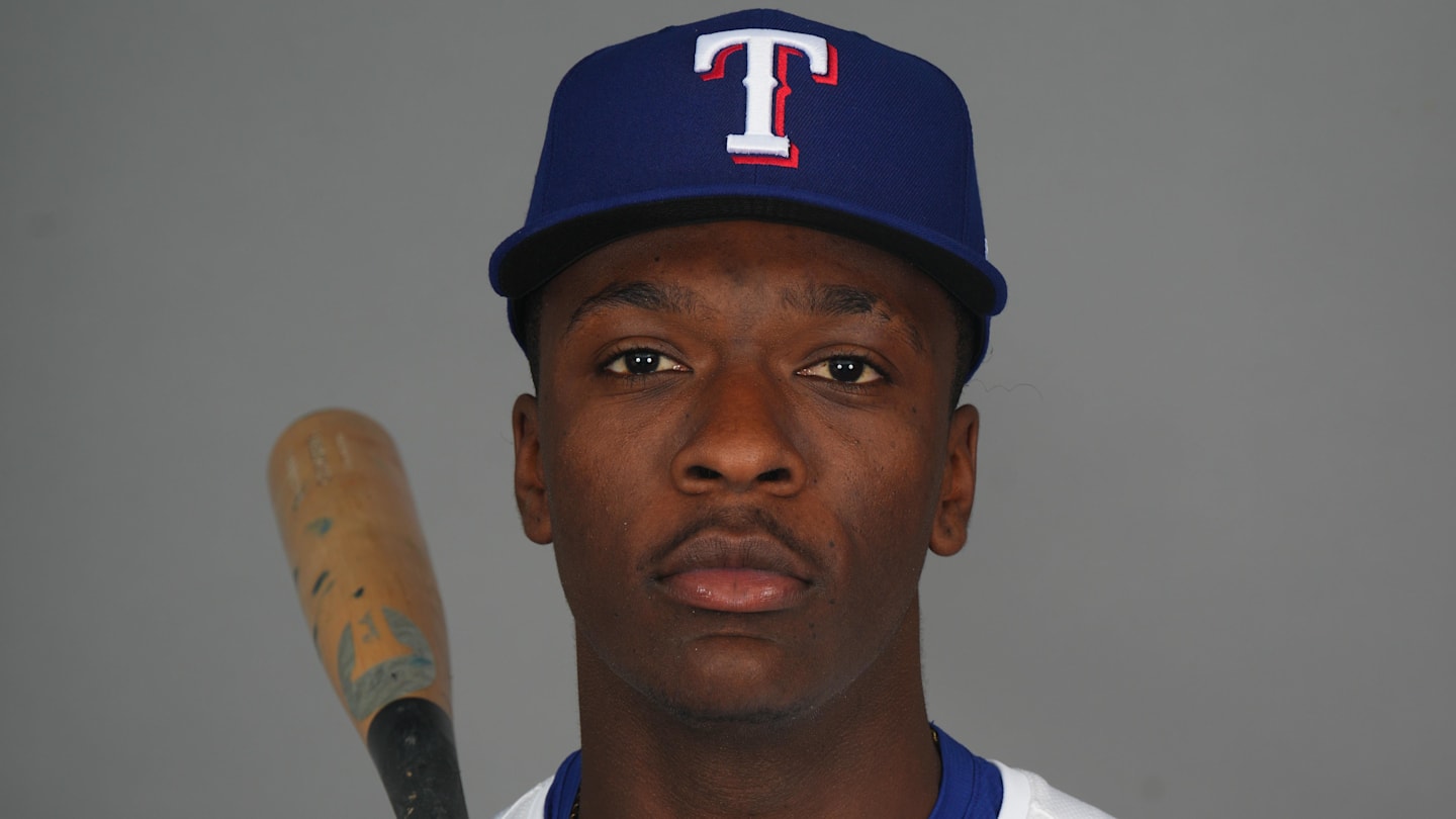 Feb 19, 2025; Surprise, AZ, USA; Texas Rangers player Sebastian Walcott poses for a photo during Media Day at Surprise Stadium. Mandatory Credit: Joe Camporeale-Imagn Images
