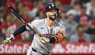 Sep 27, 2025; Anaheim, California, USA; Houston Astros first baseman Christian Walker (8) forced out at first base against the Los Angeles Angels during the sixth inning at Angel Stadium. Mandatory Credit: Jonathan Hui-Imagn Images