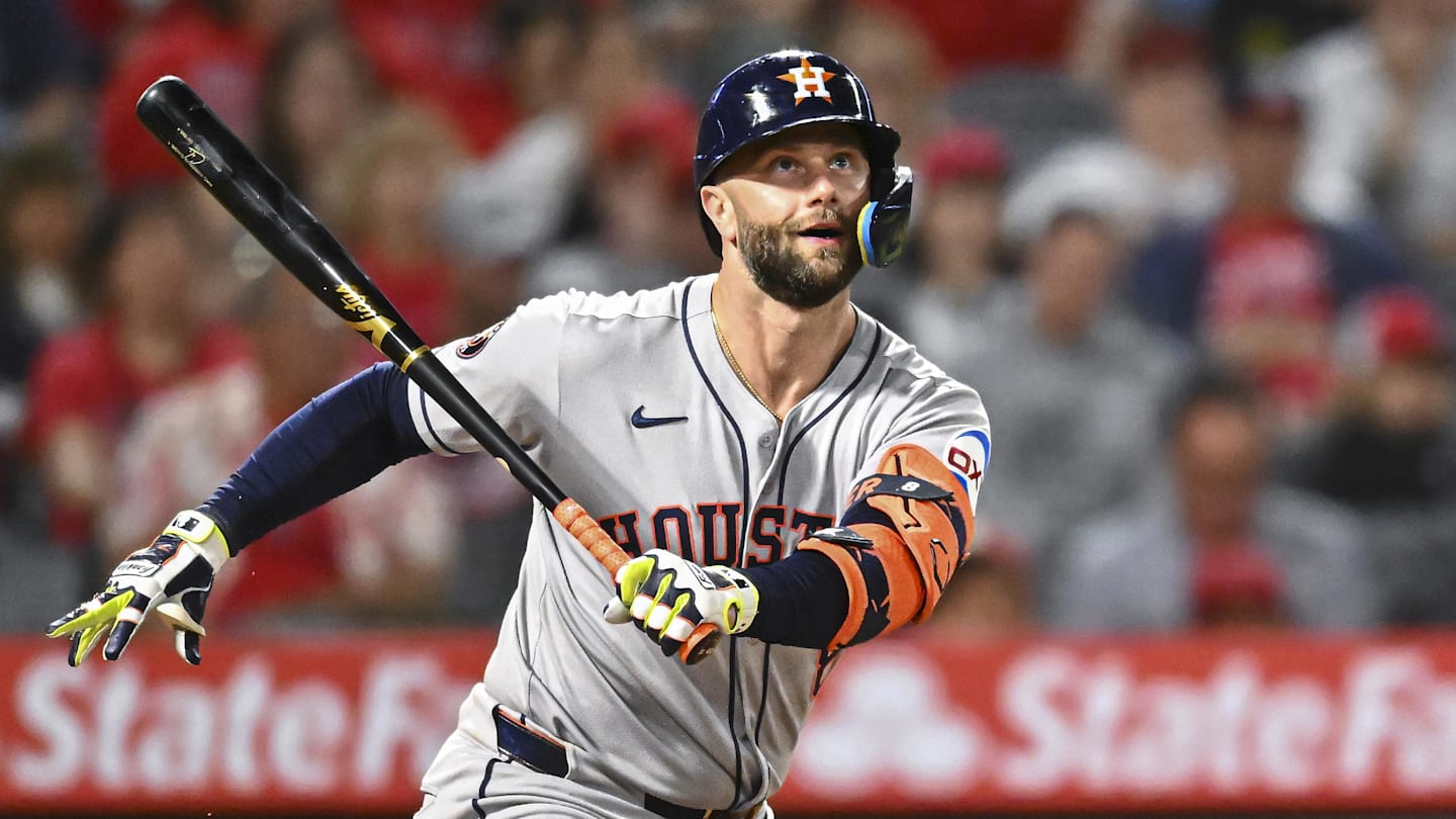 Sep 27, 2025; Anaheim, California, USA; Houston Astros first baseman Christian Walker (8) forced out at first base against the Los Angeles Angels during the sixth inning at Angel Stadium. Mandatory Credit: Jonathan Hui-Imagn Images