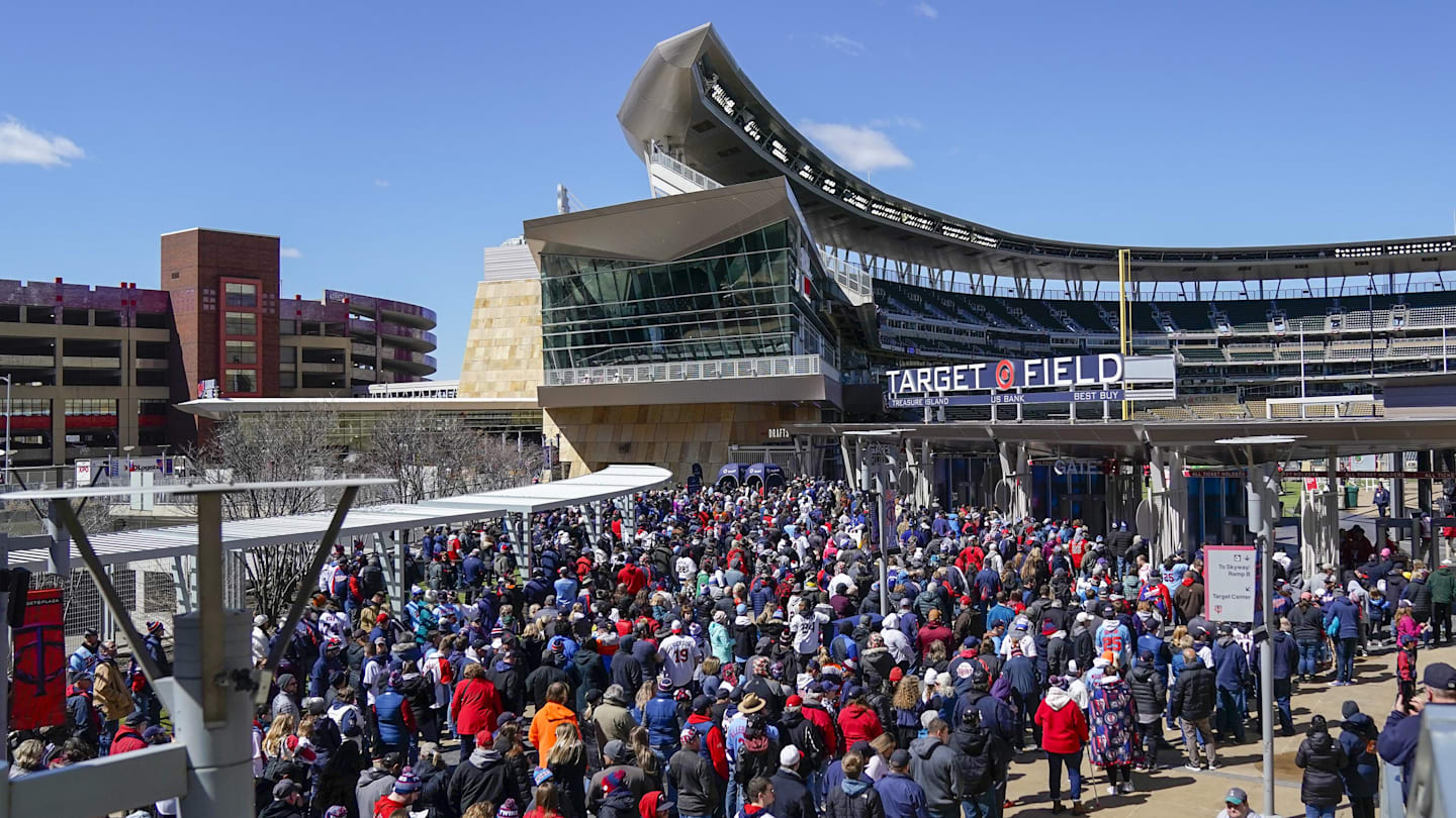Apr 8, 2022; Minneapolis, Minnesota, USA;  Fans line up to enter the stadium before a game between the Minnesota Twins and Seattle Mariners at Target Field. Mandatory Credit: Nick Wosika-Imagn Images