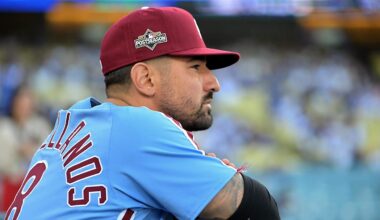 Oct 8, 2025; Los Angeles, California, USA; Philadelphia Phillies right fielder Nick Castellanos (8) looks on from the dugout during game three of the NLDS of the 2025 MLB playoffs against the Los Angeles Dodgers at Dodger Stadium. Mandatory Credit: Jayne Kamin-Oncea-Imagn Images